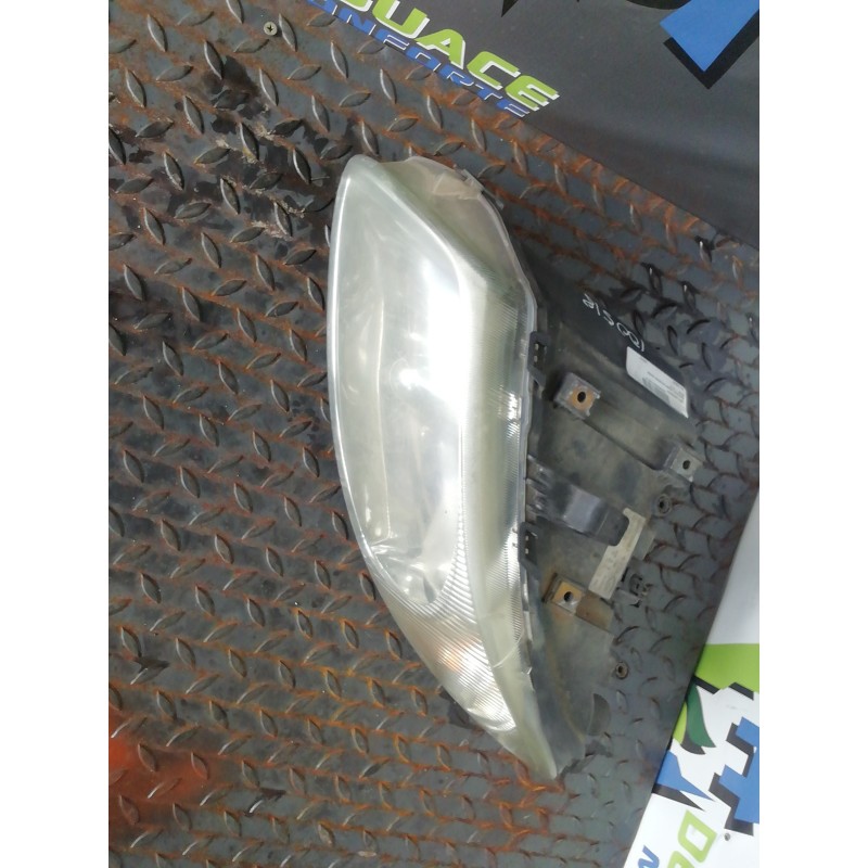 Recambio de faro derecho para chrysler grand voyager limited referencia OEM IAM 05113338AF  