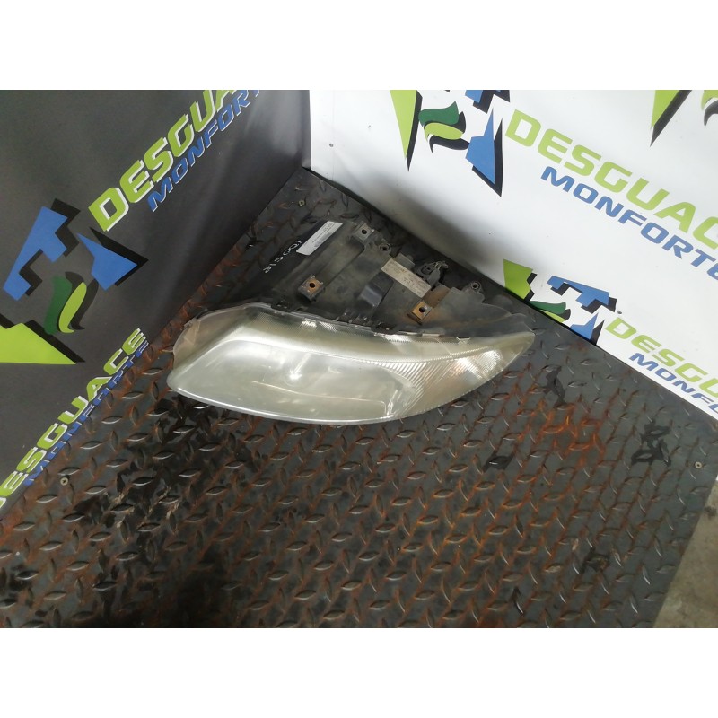 Recambio de faro izquierdo para chrysler grand voyager limited referencia OEM IAM 05113339AF  