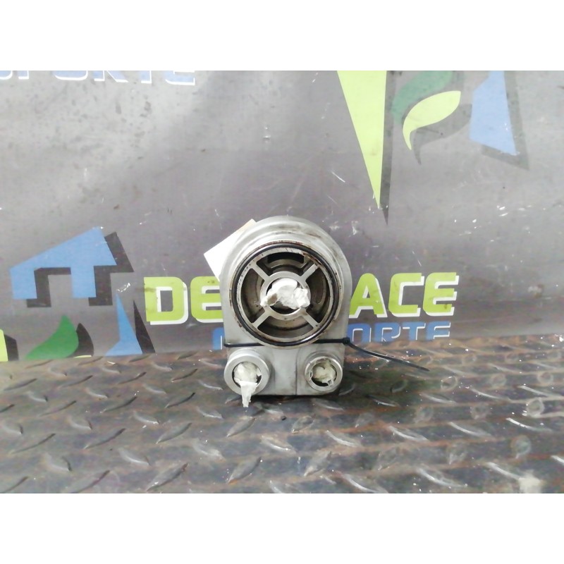 Recambio de enfriador aceite motor para dacia duster laureate 4x4 referencia OEM IAM 779744C  