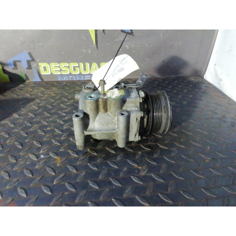 Recambio de compresor aire acondicionado para ford focus berlina (cak) ghia referencia OEM IAM YS4H19D629AB  